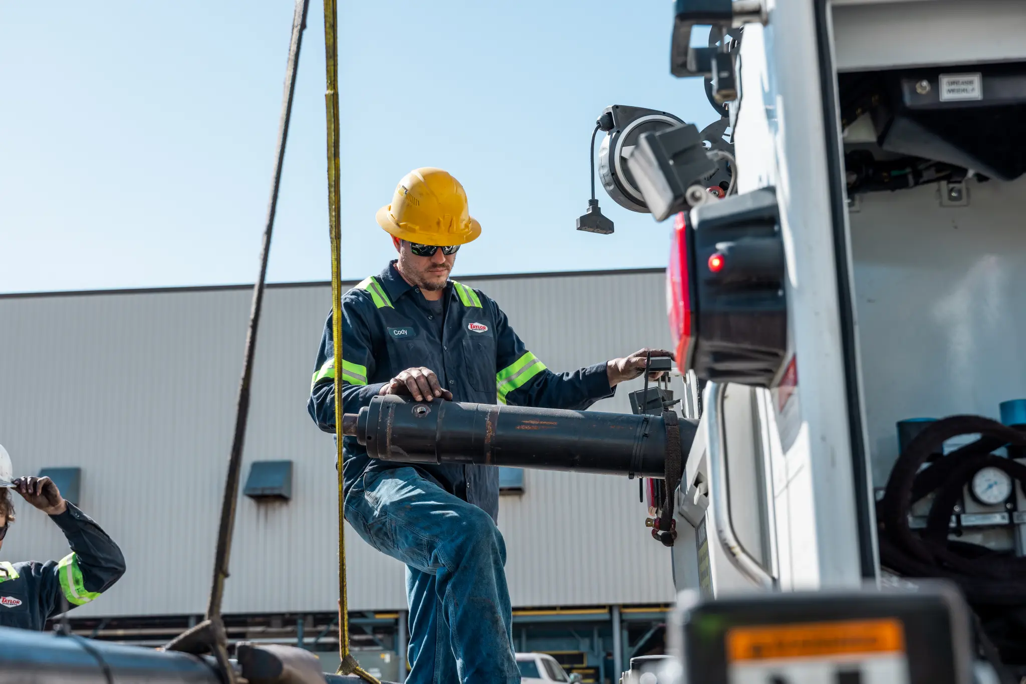 Taylor Sudden Service field technician servicing construction equipment